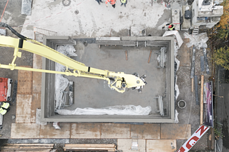 Aerial view of load-bearing normal concrete walls from the 3D concrete printer.