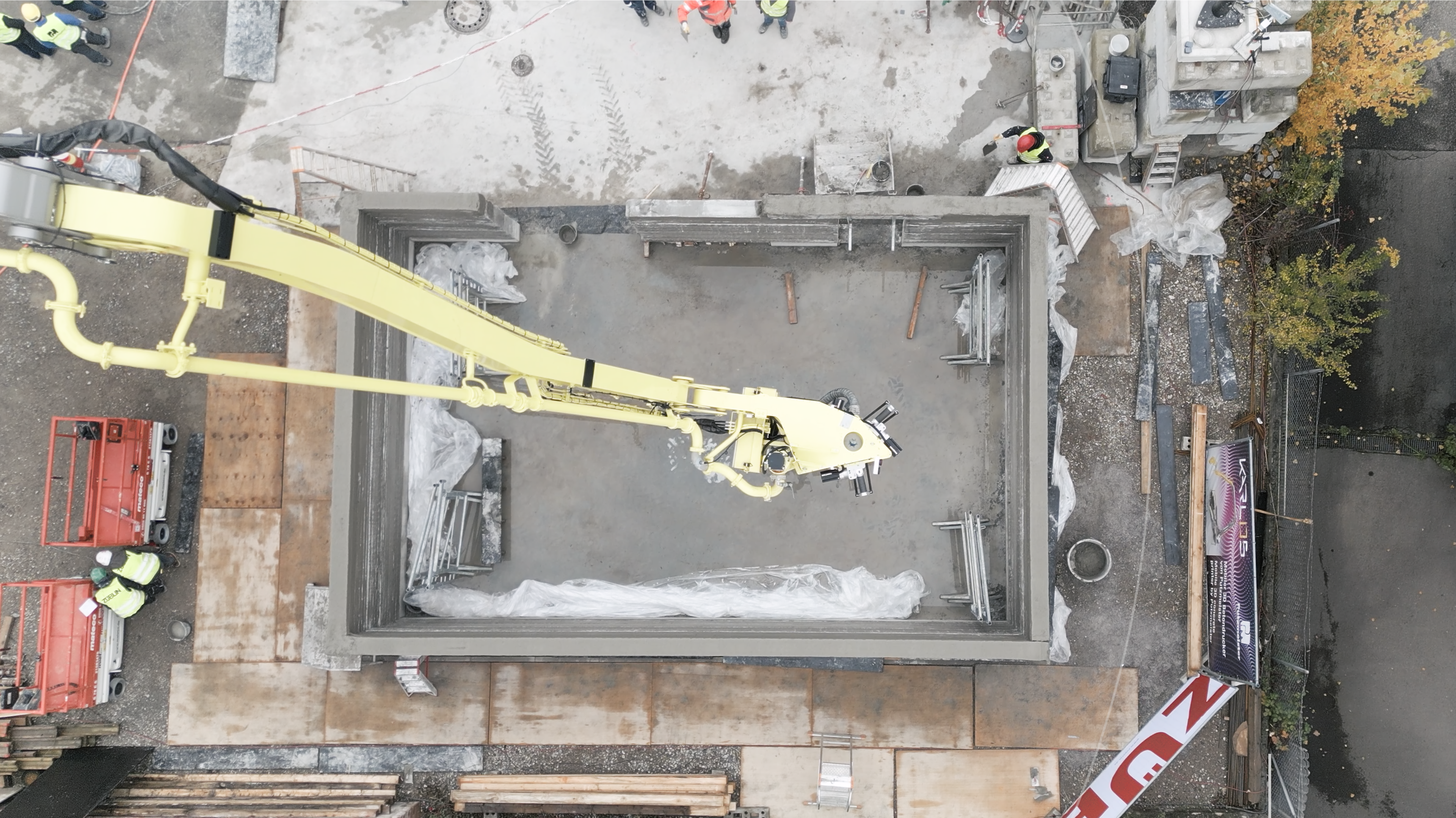 Aerial view of load-bearing normal concrete walls from the 3D concrete printer.