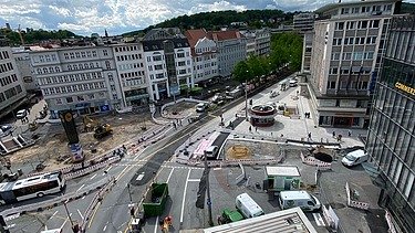 Das Bild zeigt  den zentralen Verkehrsknotenpunkt Jahnplatz in Bielefeld von oben