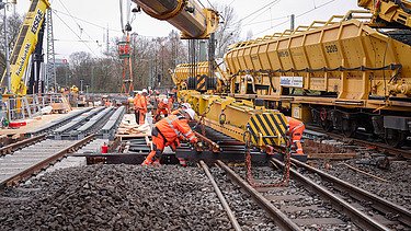People working on tracks