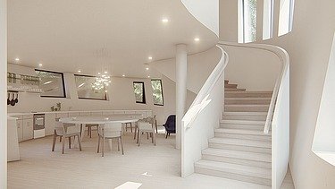 Visualisierung vom neuen Maggie’s Centre am Royal Free Hospital von innen. Es ist eine Treppe zu sehen und Tische und Stühle.  