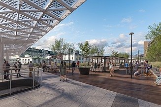 Foto von einem Vorplatz und Gehweg, dieser ist mit einem modernen Stahlgerüst überdacht