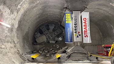 Photo of the breakthrough of the tunnel boring machine at Augistinplatz.