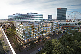 The picture shows an office building in an aerial view, with other buildings and a Ferris wheel in the background
