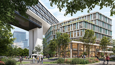 The picture shows an office building with trees in front of it