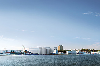 Photo of a harbor area by the sea, with blue sky