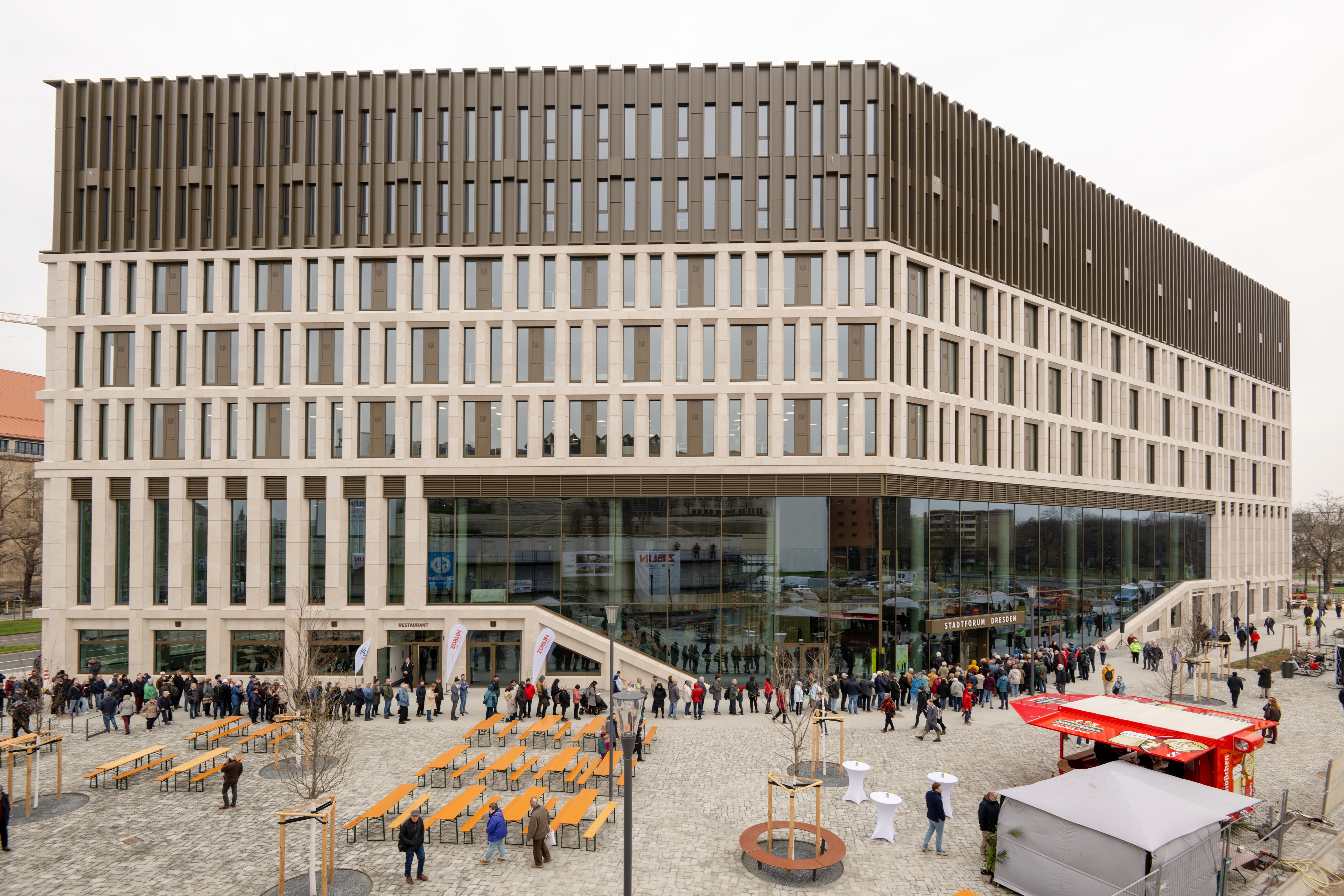 Image of a new building with a glass front at the front right
