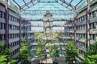 The photo shows the green interior of the ZÜBLIN office in Stuttgart.