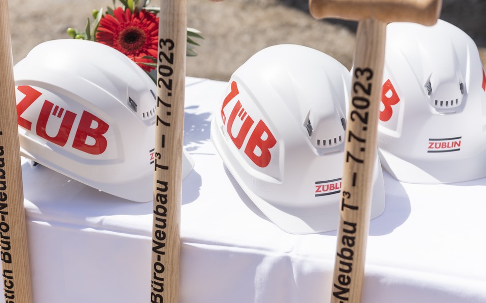 Photo of three helmets and three divisions.