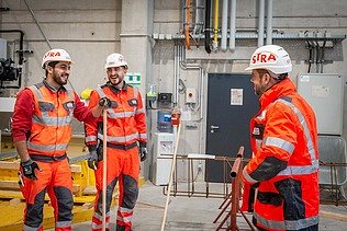 STRABAG CEO Klemens Haselsteiner together with apprentices