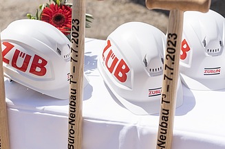 Photo of three helmets and three divisions.