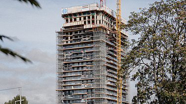 Foto von einem Hochhaus im Bau, das Gruenblick in Wien