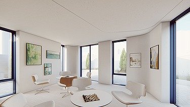 Visualisierung vom neuen Maggie’s Centre am Royal Free Hospital von innen. Alles ist weiß gehalten und Tische und Stühle sind zu sehen. An den Wänden hängen Bilder. 