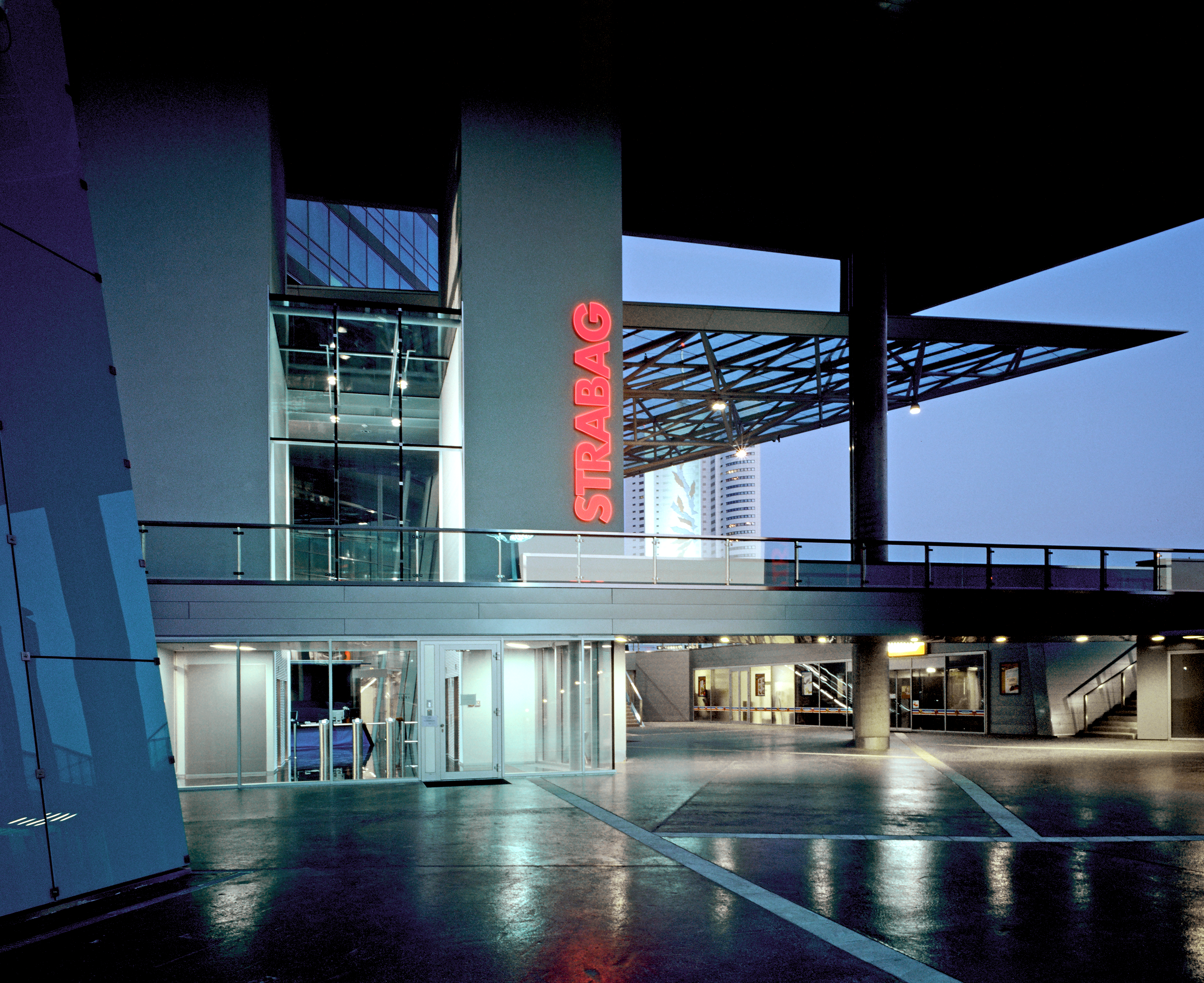 The illuminated STRABAG office can be seen at dusk in Vienna. 