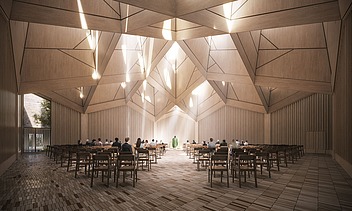 The picture shows a brightly lit interior with wooden walls