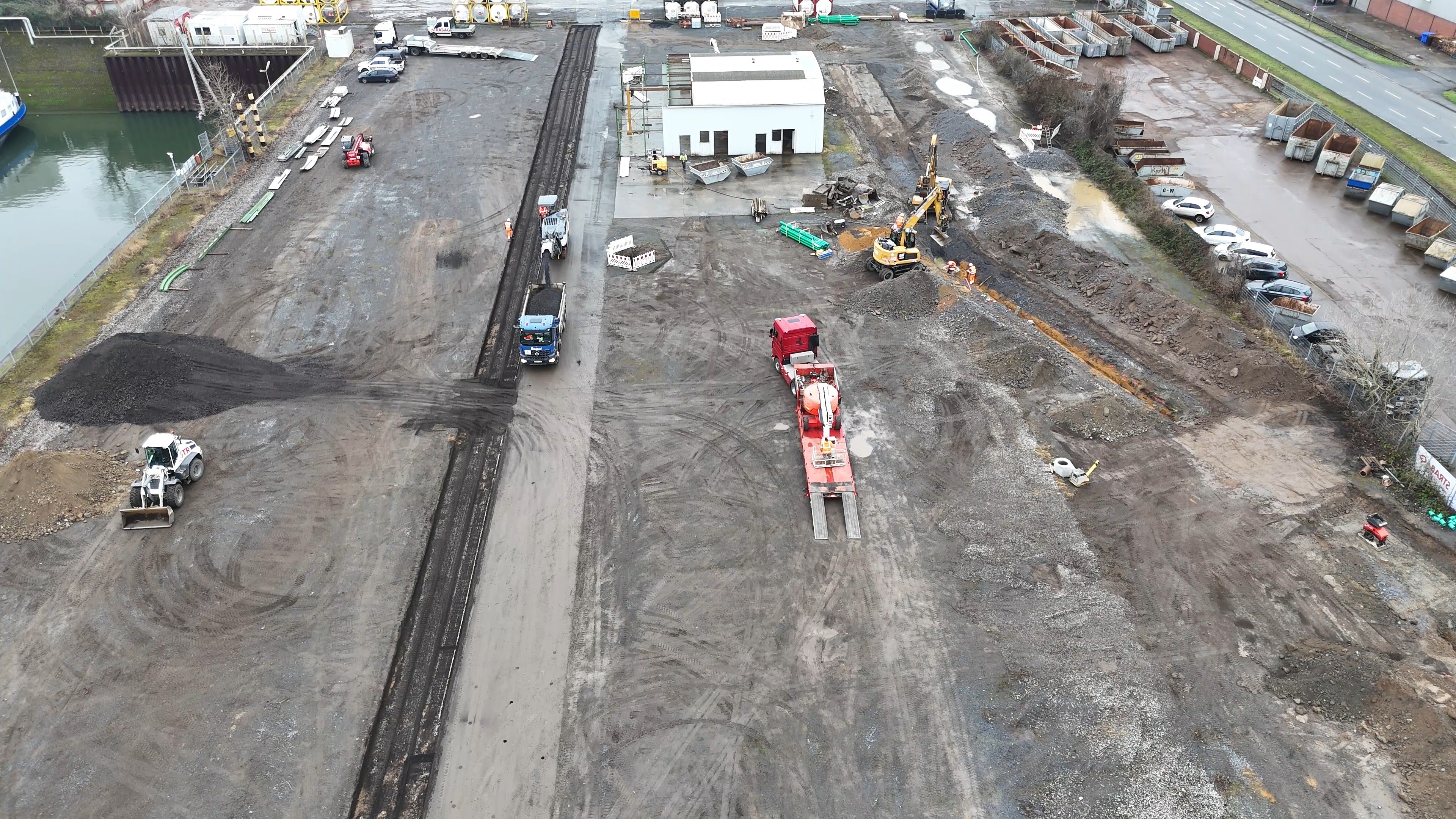 Photo from a bird's eye view. You can see a building site