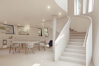 Visualisierung vom neuen Maggie’s Centre am Royal Free Hospital von innen. Es ist eine Treppe zu sehen und Tische und Stühle.  