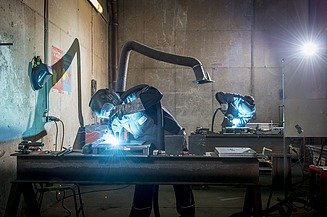 Photo of a factory hall with window production machines