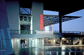 The illuminated STRABAG office can be seen at dusk in Vienna. 